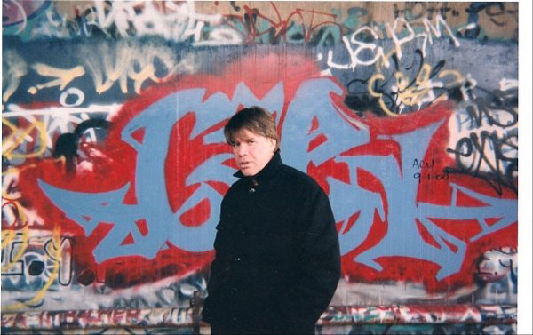 Gallery Director Chris Murray at D.C.'s graffiti "wall of fame"