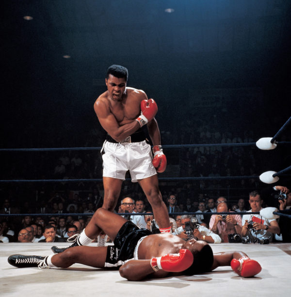 Muhammad Ali after first round knockout of Sonny Liston during World Heavyweight Title fight at St. Dominic's Arena in Lewiston, Maine on 5/25/1965.  (Item # 1001)