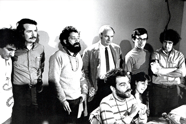 Chicago 7 members hold a press conference immediately after being charged with contempt during their conspiracy trial. Tom Hayden is on the far right. Chicago, IL, April 8, 1969. © David Fenton.