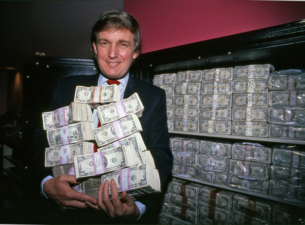 Donald Trump holding one million dollars. © Harry Benson.