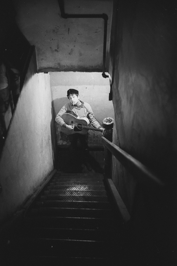 Bob Dylan coming up the stairs, Gerde's Folk City. Photograph by Ted Russell.