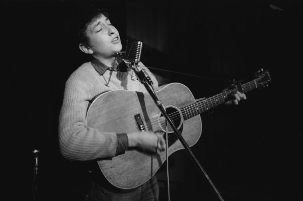 Bob Dylan performing at Gerde's Folk City in Greenwich Village, 1961. © Ted Russell.